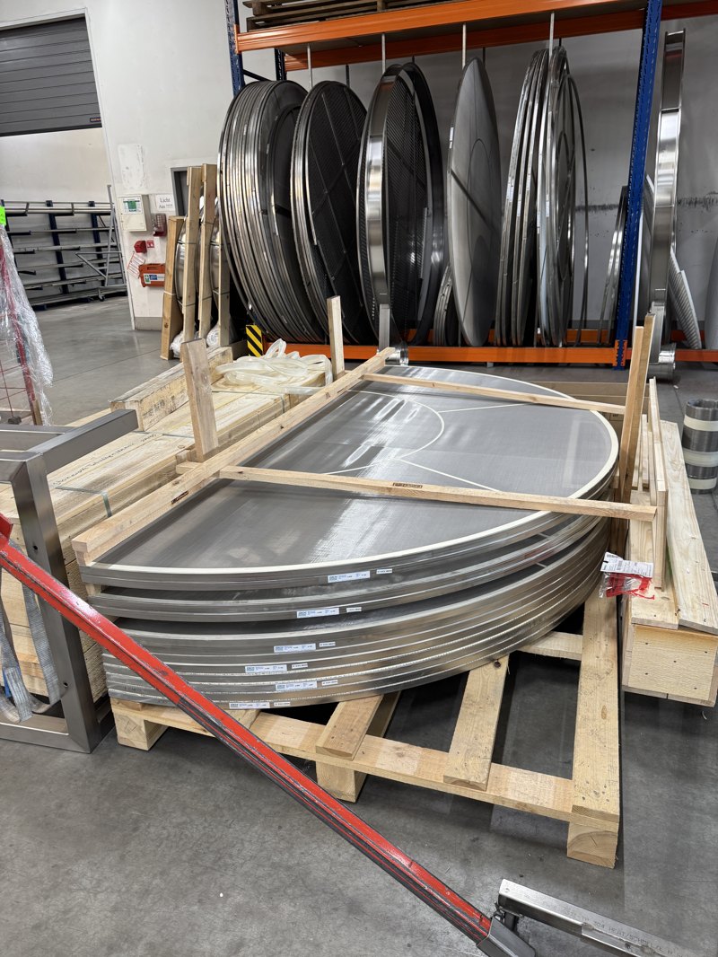 Half-moon replacement screens crated for shipment