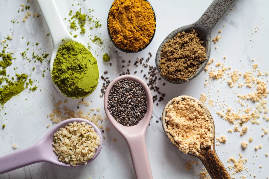 Food ingredient powders and seeds in measuring spoons